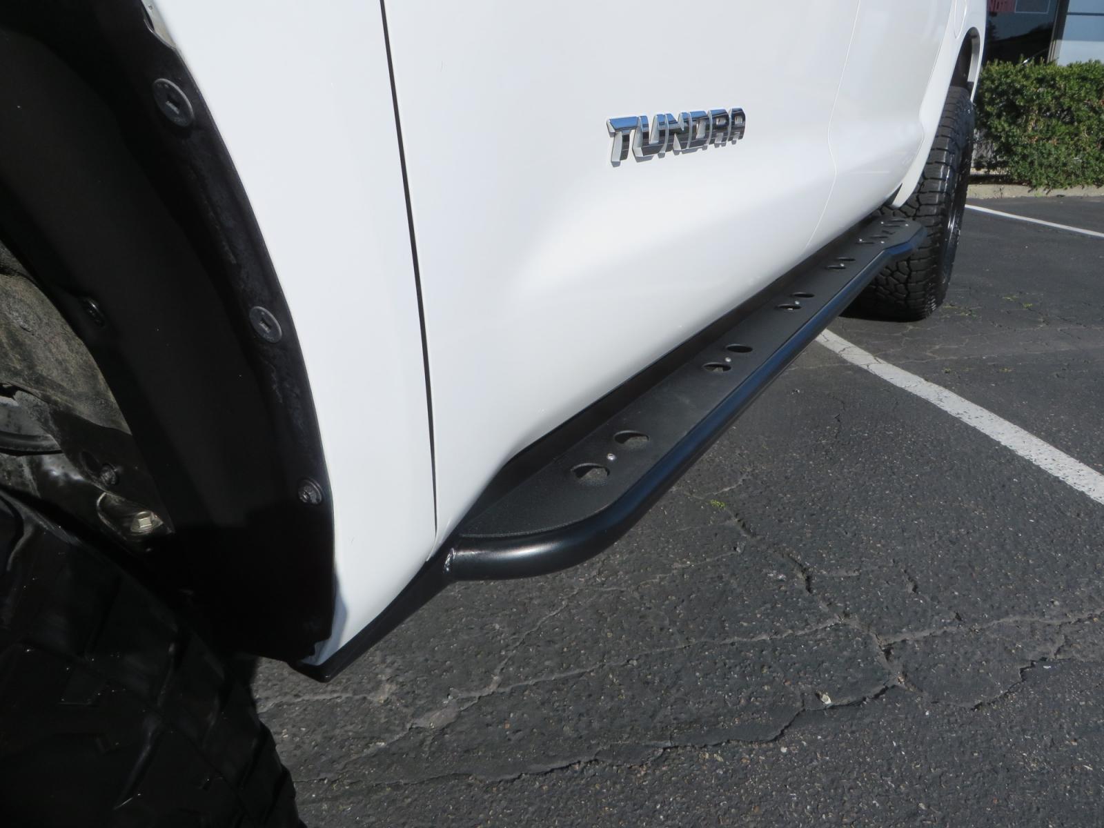 2020 White /GREY Toyota Tundra SR5 (5TFDY5F19LX) with an 5.7L engine, automatic transmission, located at 2630 Grass Valley Highway, Auburn, CA, 95603, (530) 508-5100, 38.937893, -121.095482 - Features - King Off Road adjustable remote reservoir coil overs, King 2.5 adjustable remote reservoir rear shocks, Method Race wheels, Falken Wildpeak tires, Sliders, Bed braces, Borla Exhaust, Husky floor mats, Window tint, and Ram phone mounts. - Photo #11
